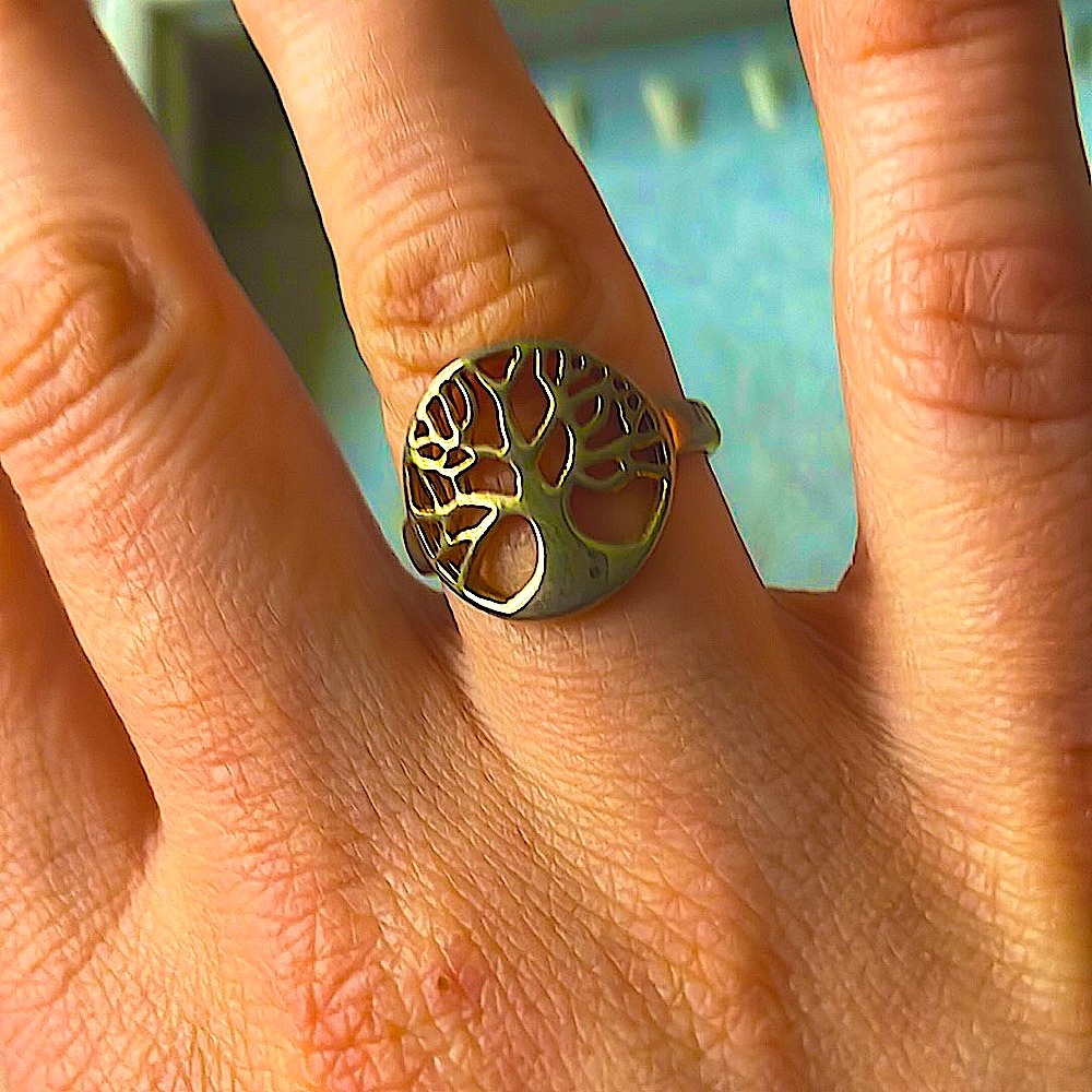 Tree of life gold plated cutout ring.